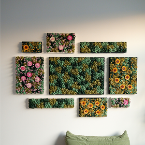 LEGO Moss Wall with multi green leaves on a white frame that look both elevated and fun. Wall frame art is on a luxury green background. 
